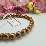 Bransoletka gumkowa koraliki akrylowe brązowe