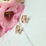 Kolczyki STAL CHIRURGICZNA bigiel kwiatki z jasnymi kryształkami