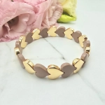 Bransoletka elastyczna serca złote i mokka