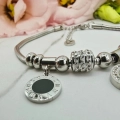 Bransoletka srebrna STAL CHIRURGICZNA CHARMS dwa medaliony 5