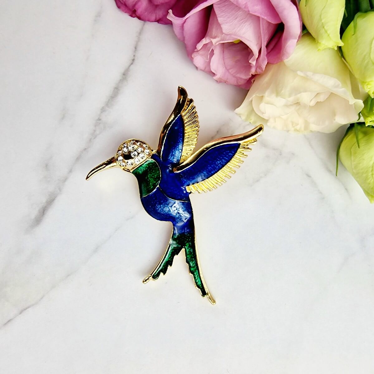 Broszka ozdobna złota koliber granatowy