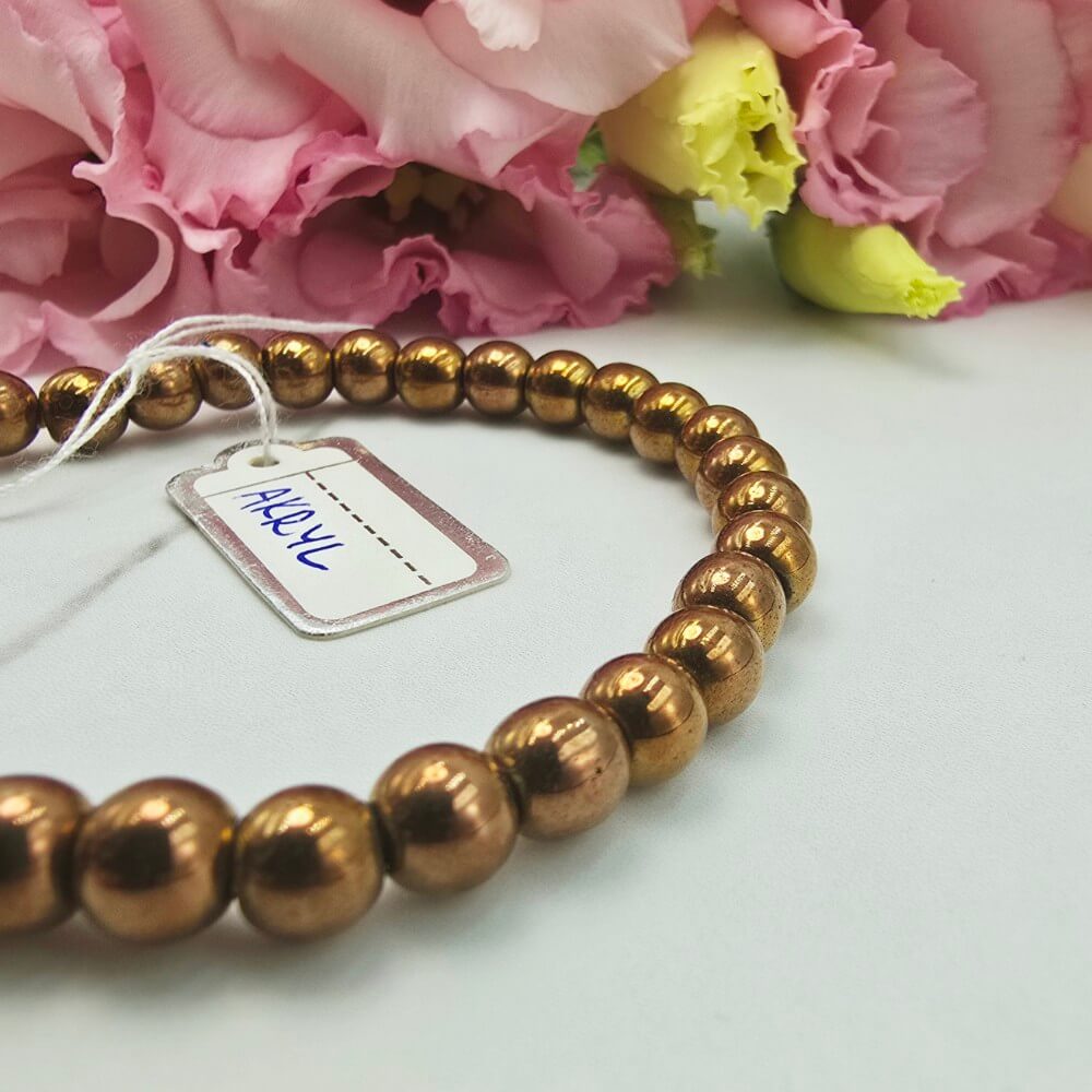 Bransoletka gumkowa koraliki akrylowe brązowe